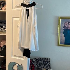 Beautiful sleeveless blouse ties In the back